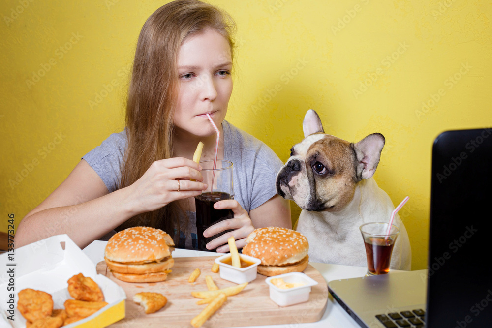 Girl and dog eating fast food Stock Photo Adobe Stock