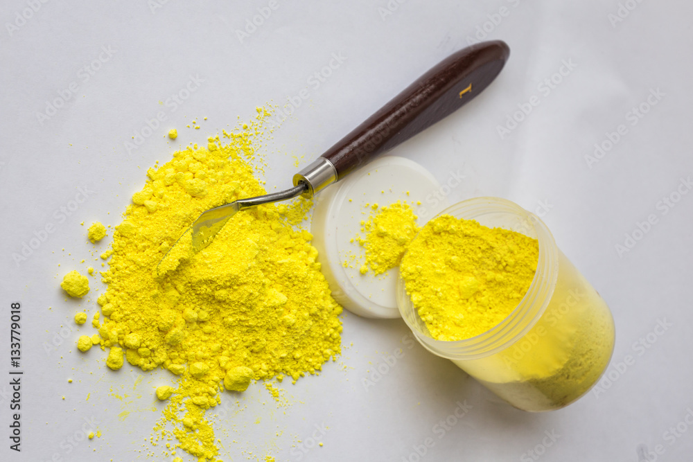 Yellow pigment on a white background Yellow pigment on a white background