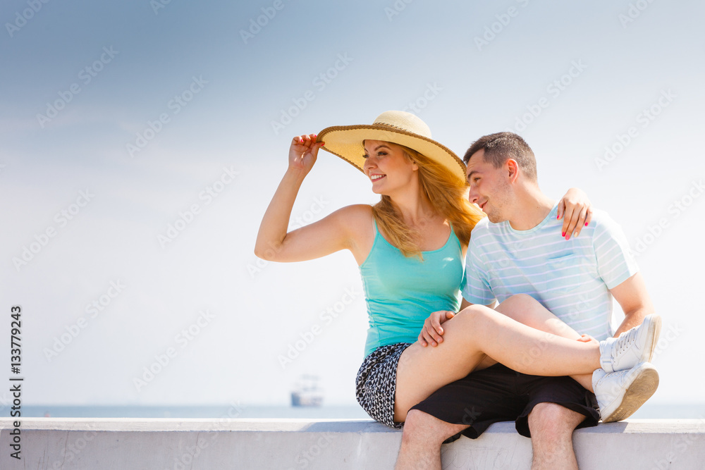 Man and woman sitting together outside Man and woman sitting together outside