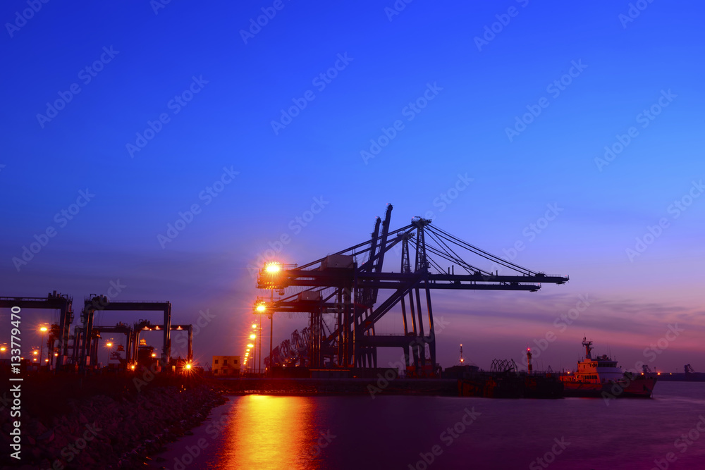 Fototapeta premium Working cranes, in the evening