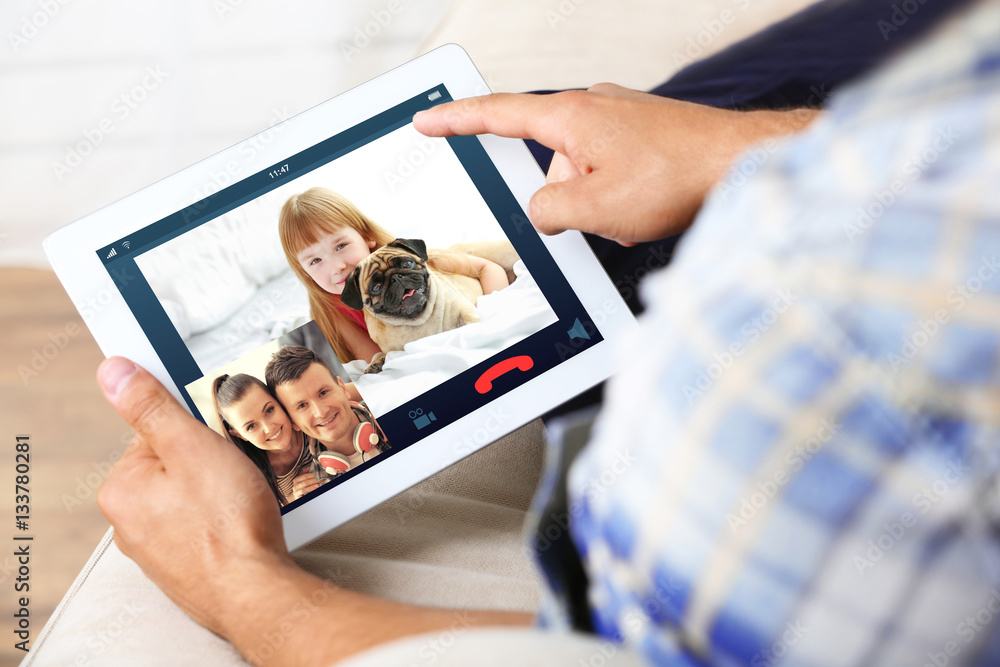 Video call and chat concept. Man video conferencing on tablet