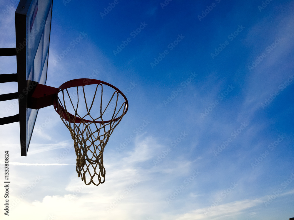 Basketball basket net on blue sky outdoors background