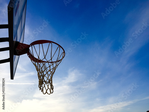 Basketball basket net on blue sky outdoors background