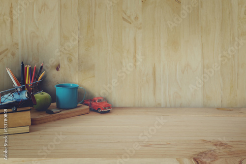 Hero header. Vintage Toy and gadgets on a wooden table background. photo
