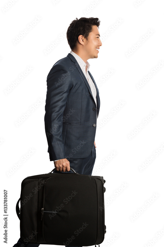 Happy good looking businessman traveling with his bag. Standing in front of a white background. Happy good looking businessman traveling with his bag. Standing in front of a white background.