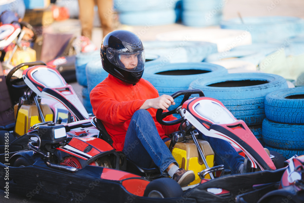 Young Man Is Driving Go-Kart