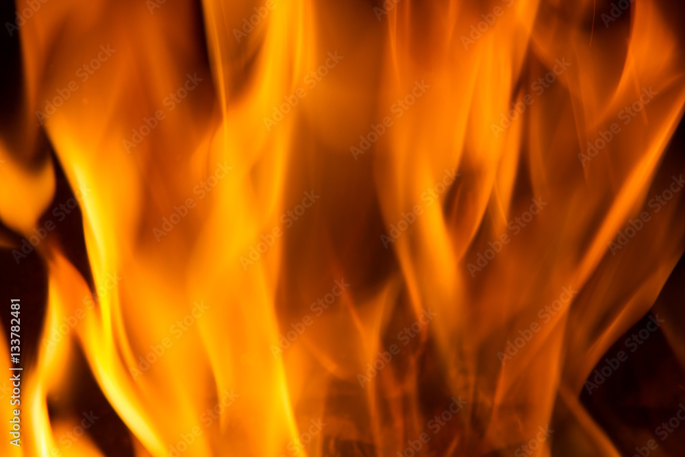 Background on black forks of flames yellow orange and red Background on black forks of flames yellow orange and red
