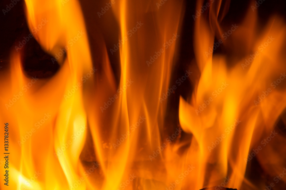 Background on black forks of flames yellow orange and red Background on black forks of flames yellow orange and red