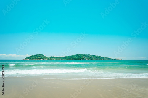 Campeche Island: Beach and an island in the background on a beautiful sunny day landscape. © Vinícius Bacarin