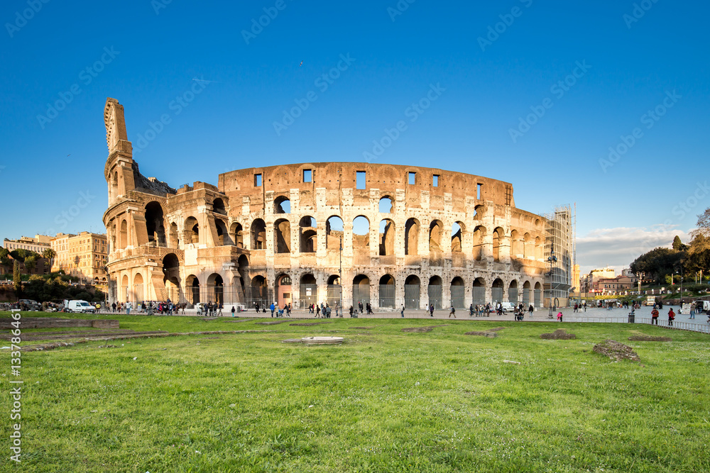 View of Colosseum in Rome and sunset in Italy.