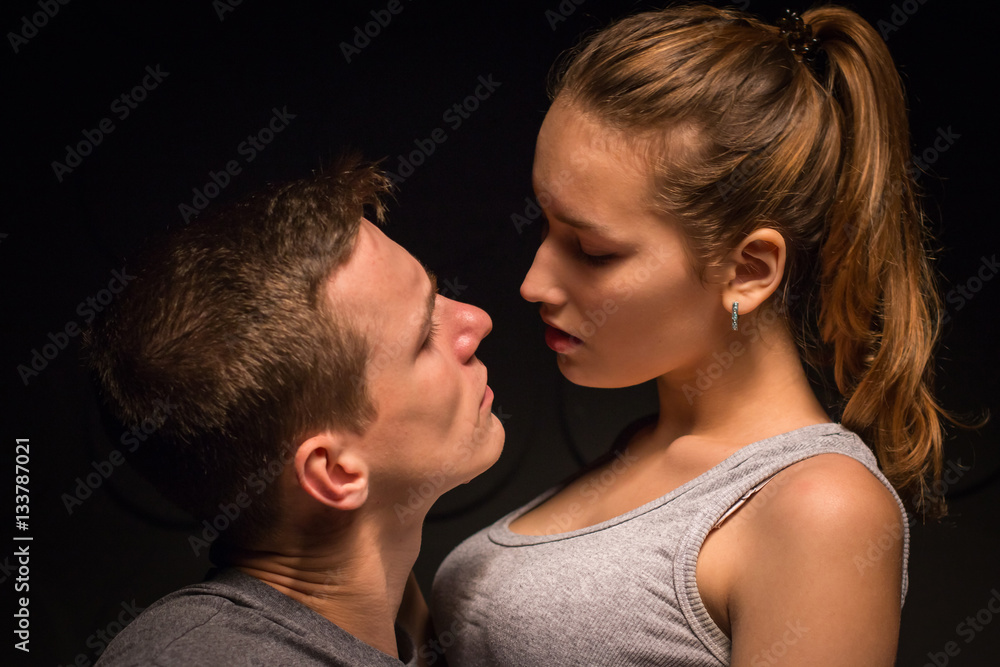 Passionate young couple in the room Passionate young couple in the room