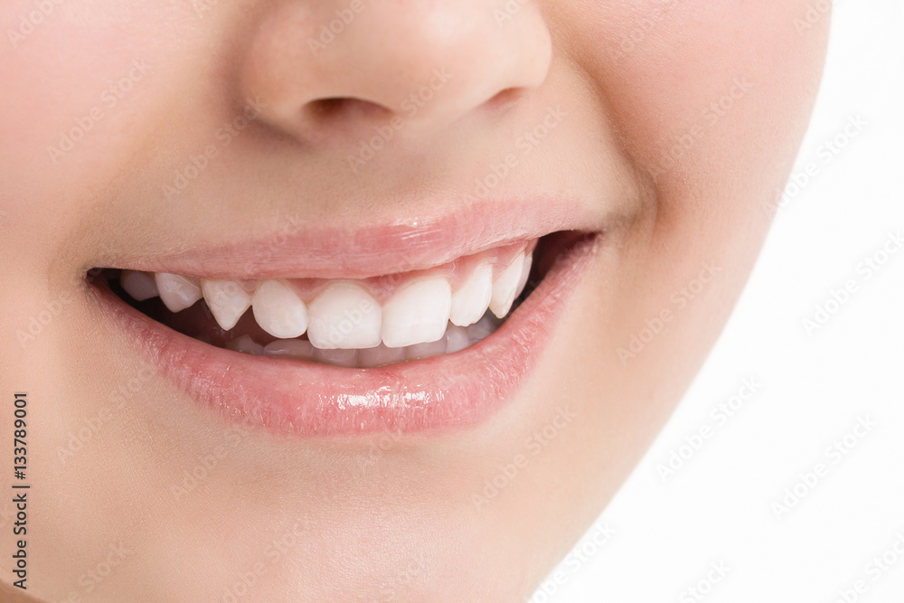 Naklejka premium Women smile. Face. White teeth. Photo closeup