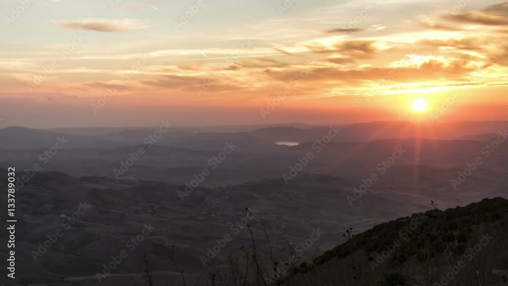 Sunset over hills in timelapse Sunset over hills in timelapse