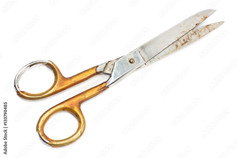 Old rusty sewing scissors isolated on white Old rusty sewing scissors isolated on white