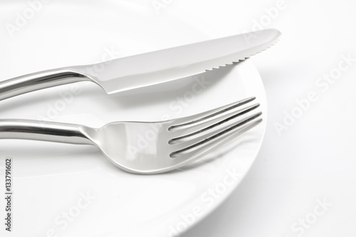 plate with fork and knife isolated