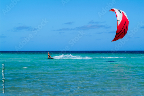 Man practicing kitesurf on Mayotte island, France