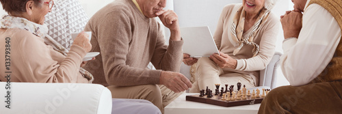 Seniors playing chess photo