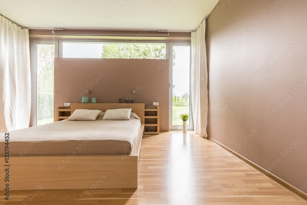 Double bed in minimalist bedroom