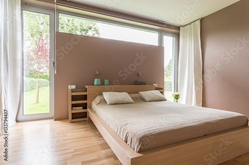 Nude bright bedroom interior