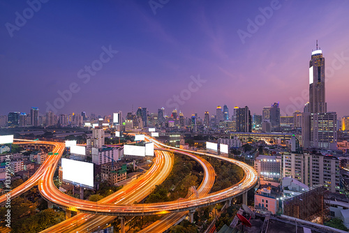 The highway blank white billboard in metropolis with traffic