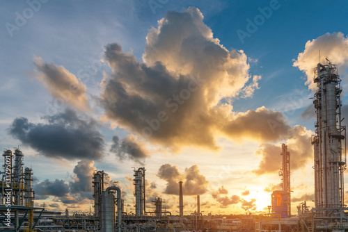 The sunshine scene at sunset of oil and gas refinery plant