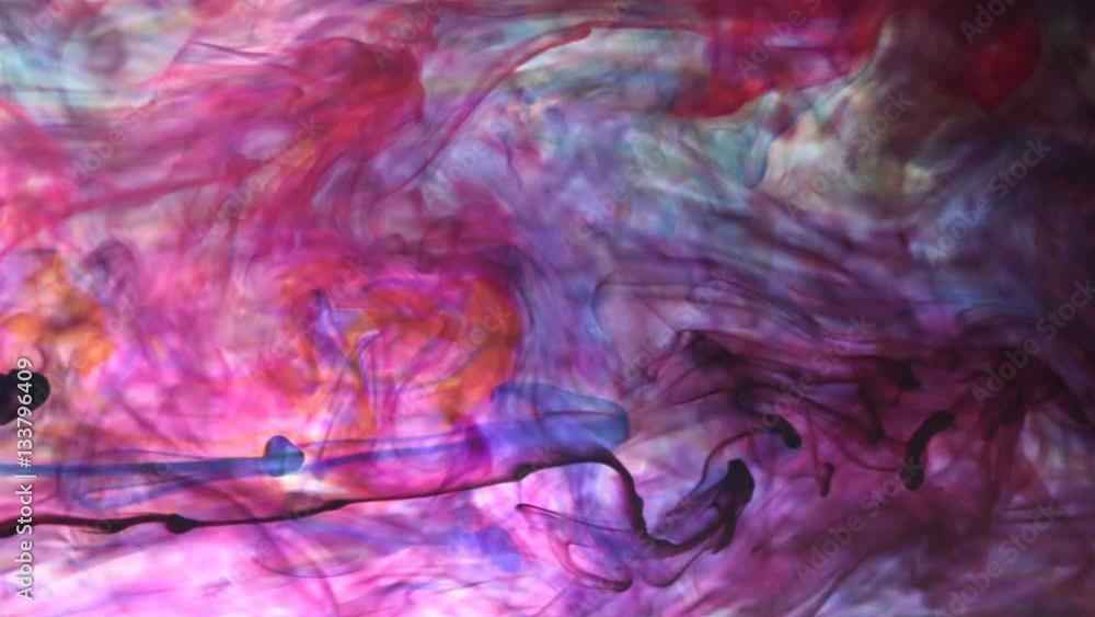 Color Ink flowing in water on white background
Color Ink flowing in water on white background