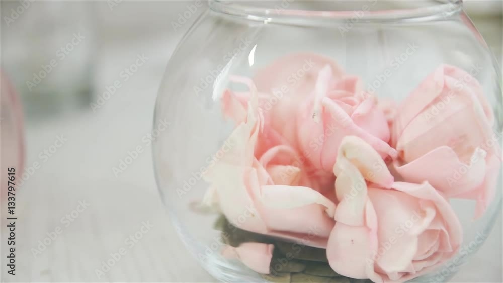 White light room with bouquets of roses, standing on the floor. White light room with bouquets of roses, standing on the floor.