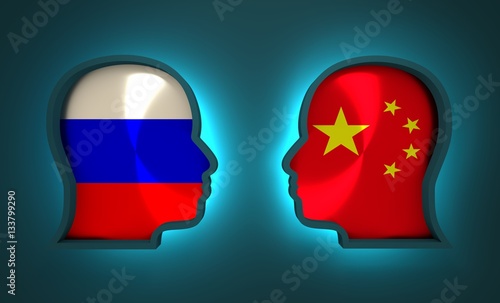 Image relative to politic and economic relationship between Russia and China. National flags inside the heads of the businessmen. Teamwork concept. 3D rendering. Neon light