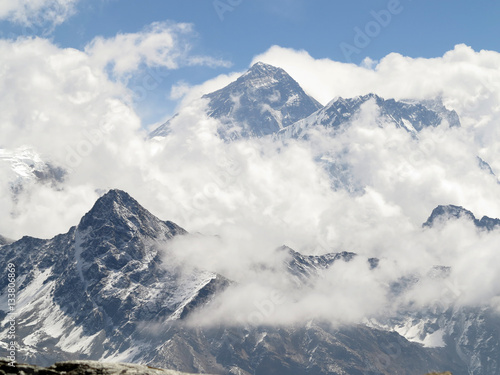 Mt Everest surrounded by clouds © Joe