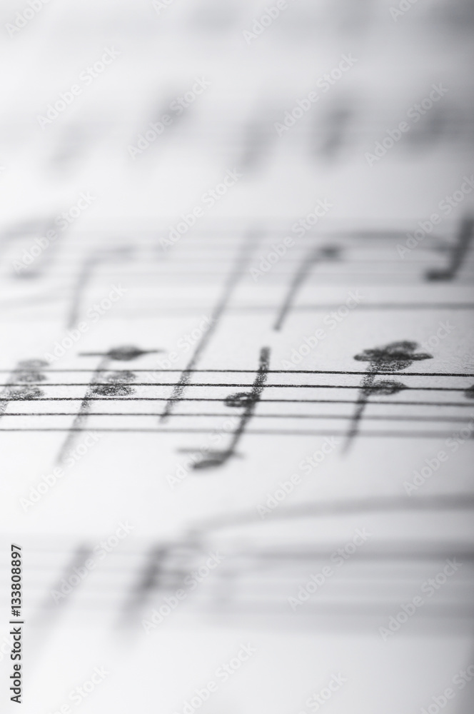 Fototapeta Handwritten musical notes, shallow DOF