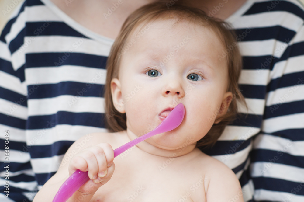 little girl playing with a spoon little girl playing with a spoon