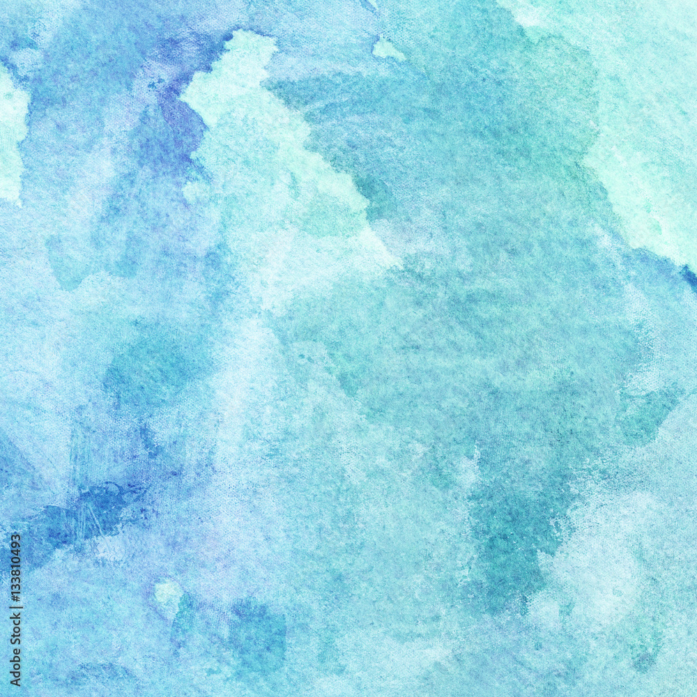 Abstract watercolor hand painted background in blue shades 