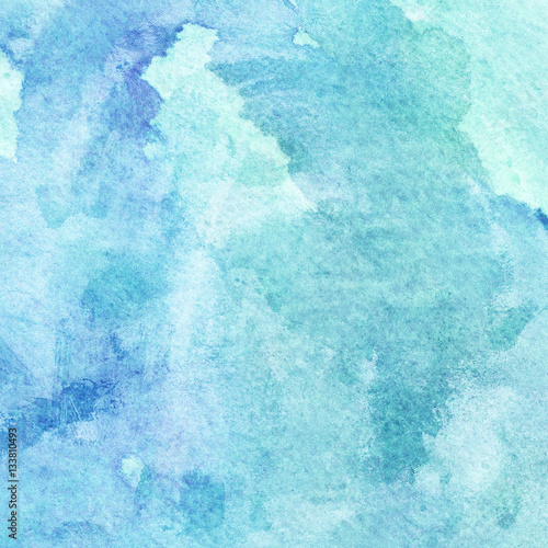 Abstract watercolor hand painted background in blue shades 