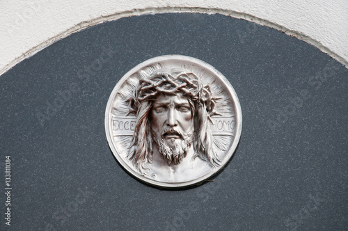 gravestone with jesus portrait