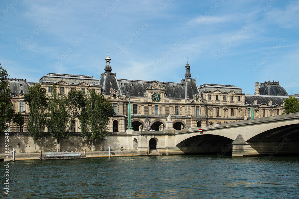 Royal bridge, Seine river embankment, Louvre museum in Paris