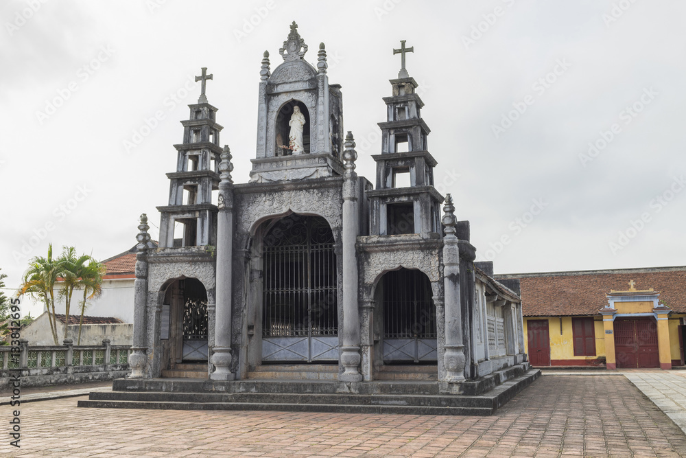 Obraz premium Small church in Phat Diem Stone Cathedral - one of the most famous and beautiful churches and travel destination in Vietnam. It took 24 years to build this church from 1875 to 1898