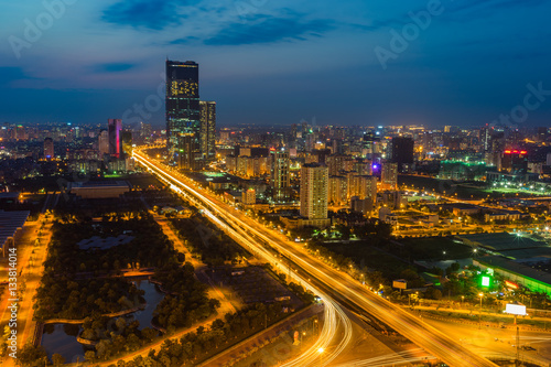 Aerial skyline view of Hanoi cityscape at twilight. Thang Long freeway and Pham Hung street © Hanoi Photography