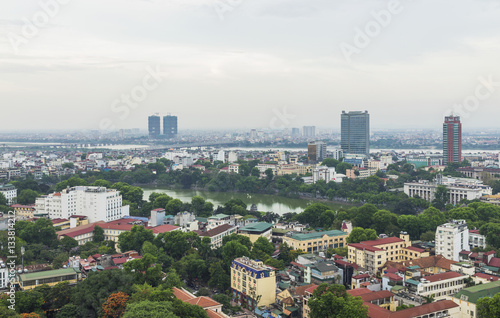 Fototapeta Naklejka Na Ścianę i Meble -  Aerial view of Hanoi cityscape at twilight. Viewing from Ly Thuong Kiet street, south of Hoan Kiem lake