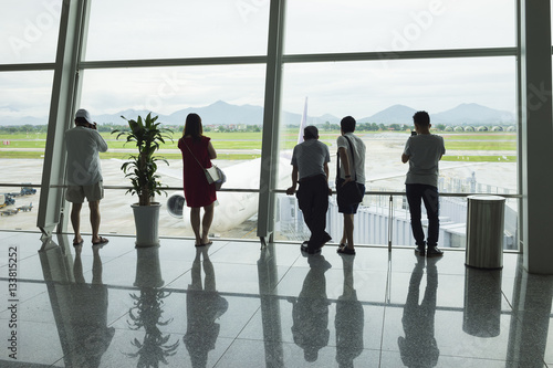 Airline passengers silhouettes at airport