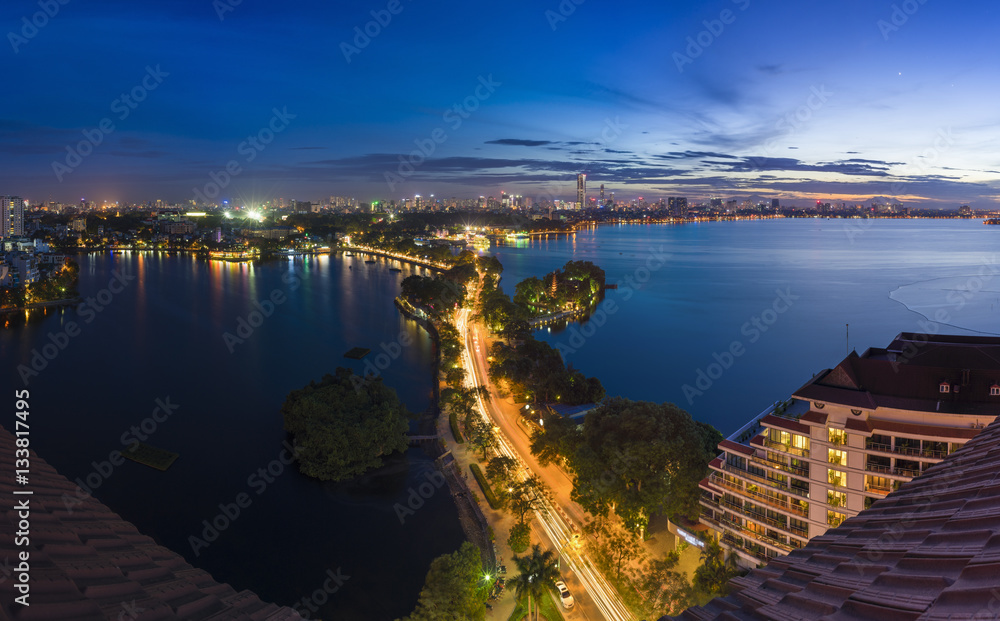 Hanoi skyline cityscape at twilight period. West Lake aerial view