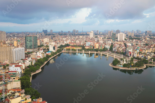 Aerial view of urban skyline at twilight. Hanoi cityscape. Dong Da lake view