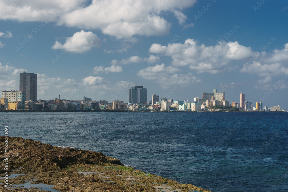 Naklejka premium La Havana, Cuba: City view from Malecon on sunny day. Malecon it's the most touristic place in La Havana