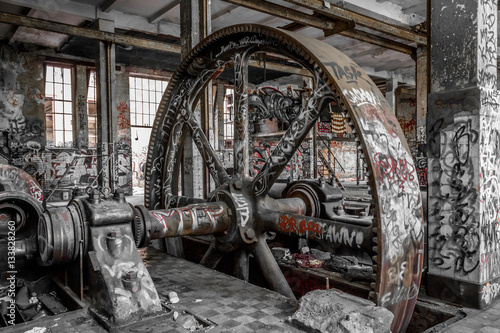   industrial machinery in abandoned factory