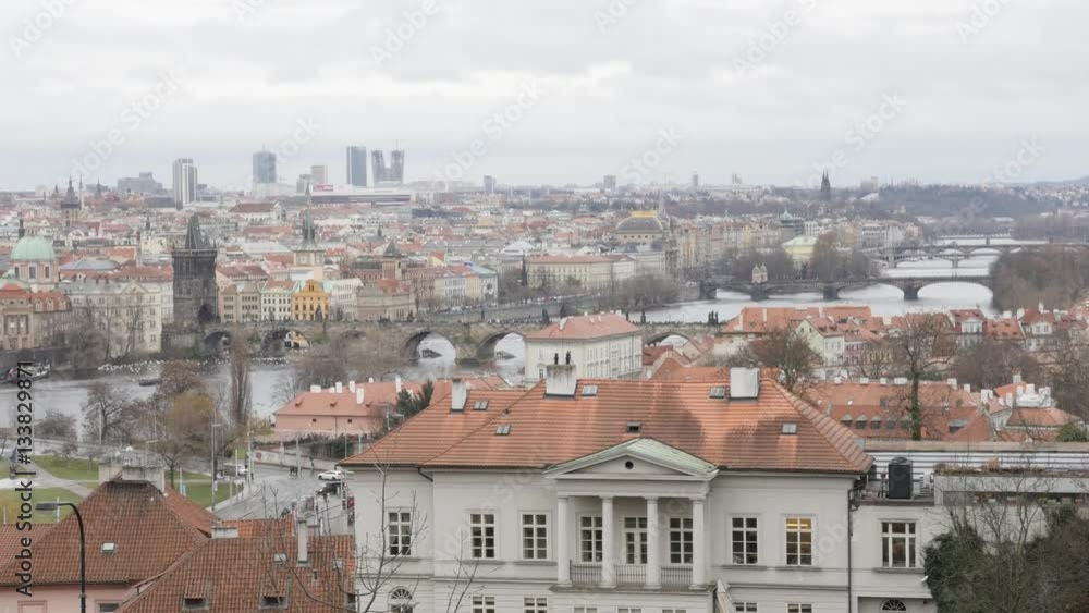 Cityscape of Czech Republic Prague and Vltava river on cloudy day slow tilt 3840X2160 UHD footage - Tilting on rooftop famous spires and domes in capital of Czechia 2160p UltraHD video Cityscape of Czech Republic Prague and Vltava river on cloudy day slow tilt 3840X2160 UHD footage - Tilting on rooftop famous spires and domes in capital of Czechia 2160p UltraHD video