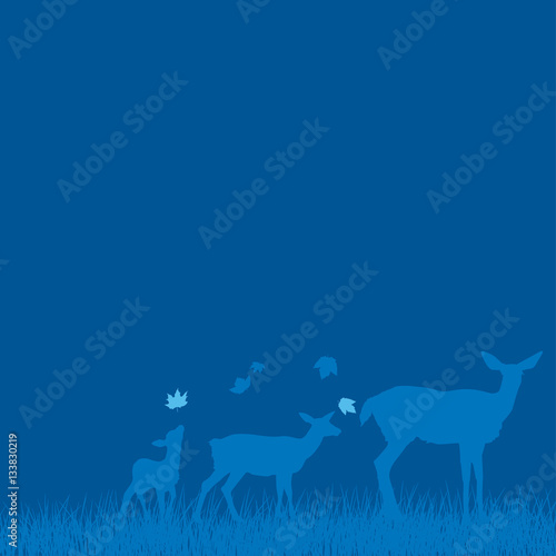 Deer family silhouetted on a blue background with cropped grass and falling leaves.