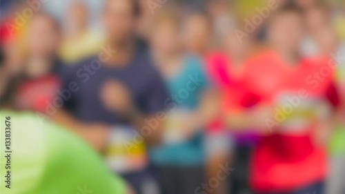 Wallpaper Mural Closeup blurred shot of people running on marathon at hot sunny day Torontodigital.ca