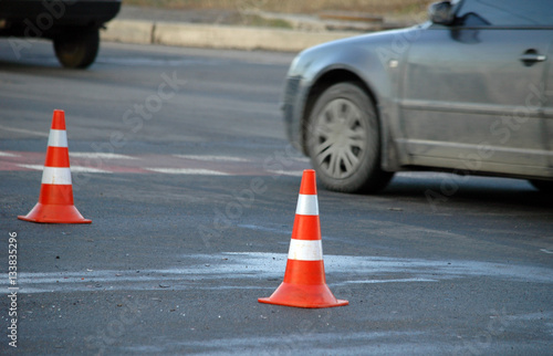 Road hazard cone on accident site