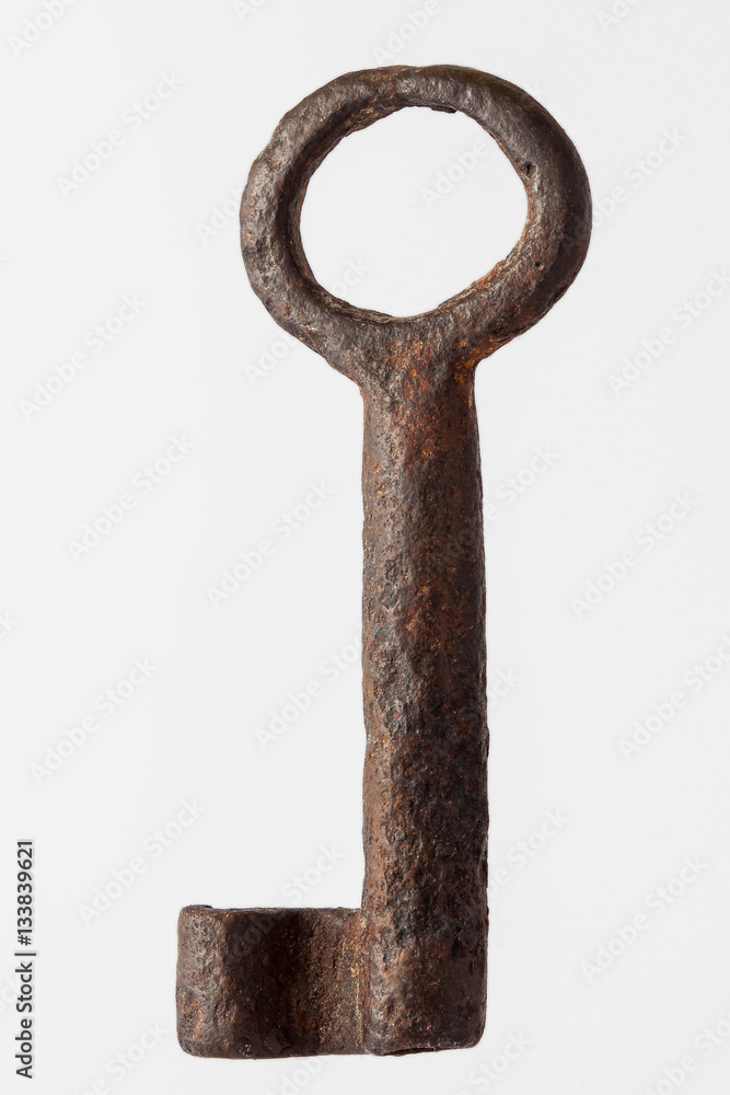 Antique rusty key isolated on white background Antique rusty key isolated on white background