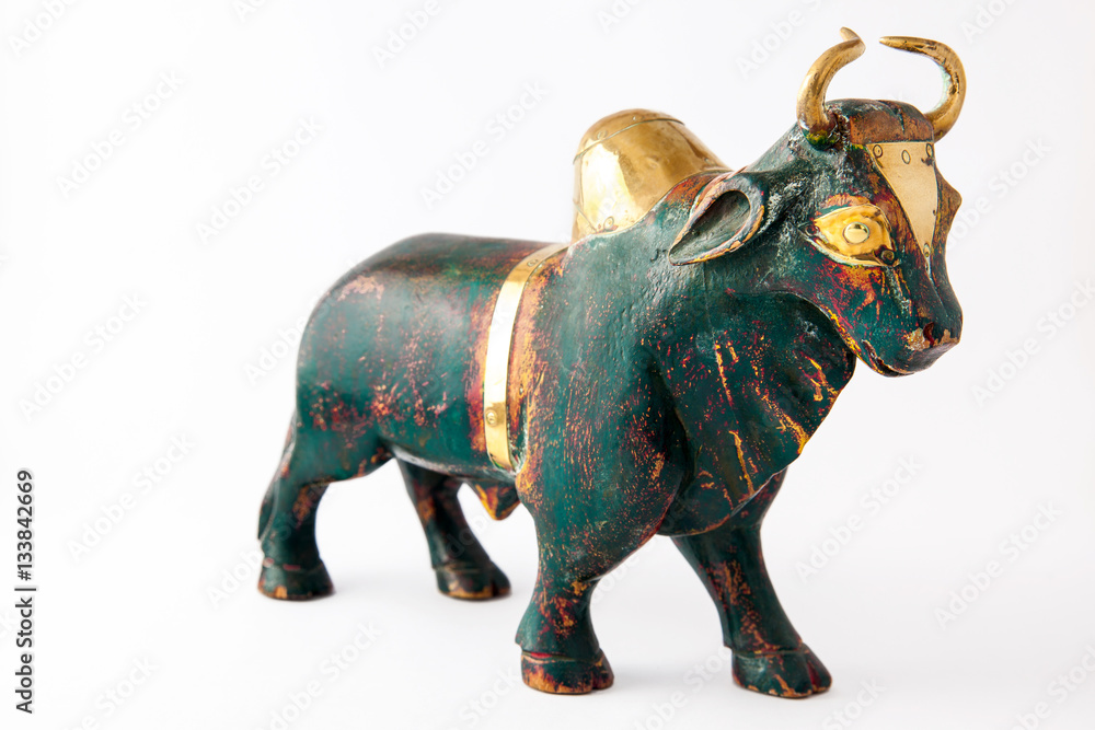 Fototapeta premium Wooden bull on white background