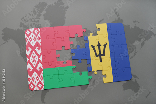 puzzle with the national flag of belarus and barbados on a world map